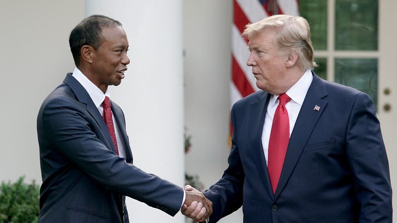 Tiger Woods shaking Donald Trump's hand