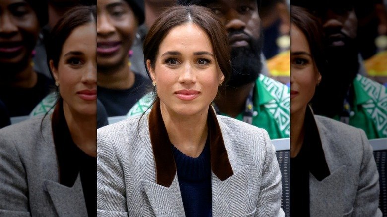 Meghan Markle, Duchess of Sussex, wearing gray blazer