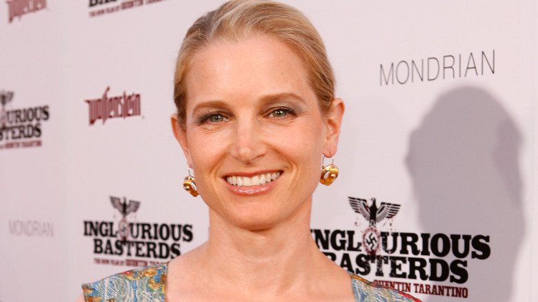 Bridget Fonda smiling in full glam