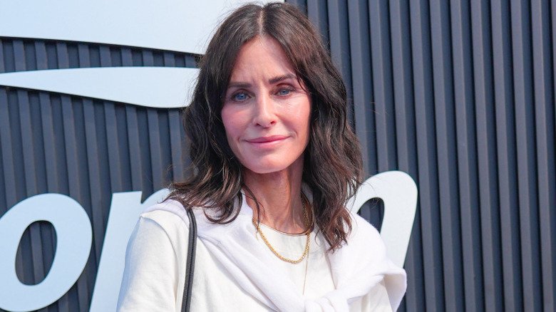Courteney Cox wearing all white