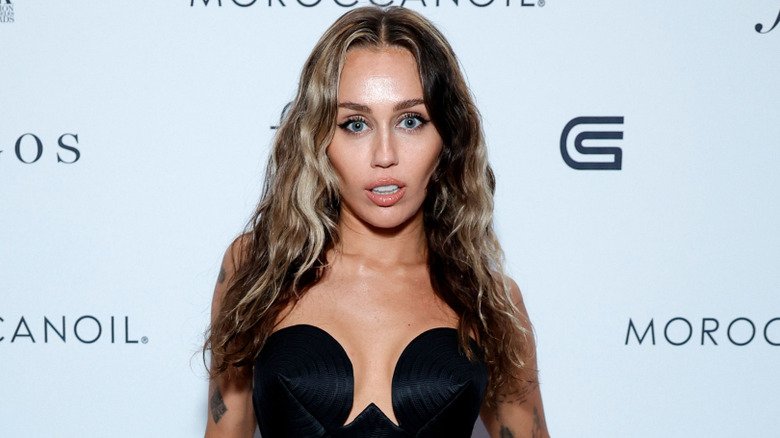 Miley Cyrus in a black dress