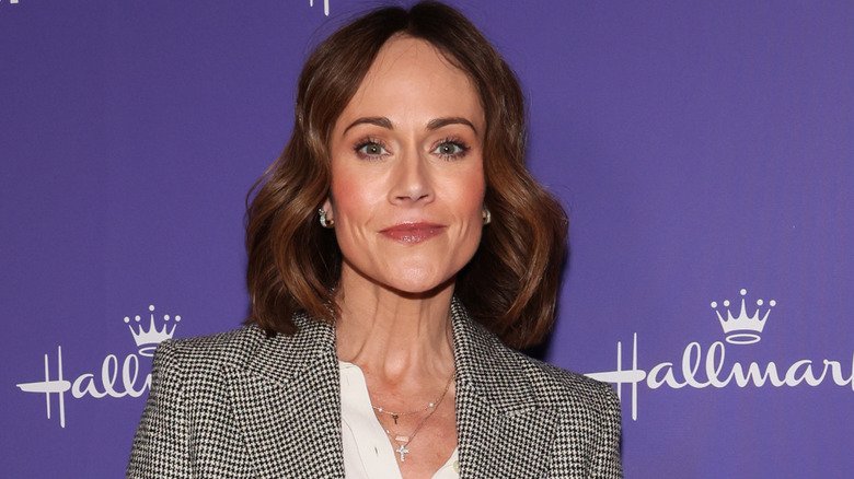 Nikki DeLoach posing at a Hallmark event