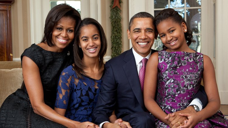 Michelle, Malia, Barack, and Sasha Obama posing