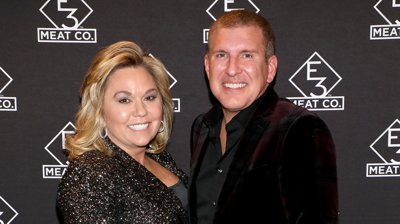 Julie Chrisley and Todd Chrisley smile for the camera