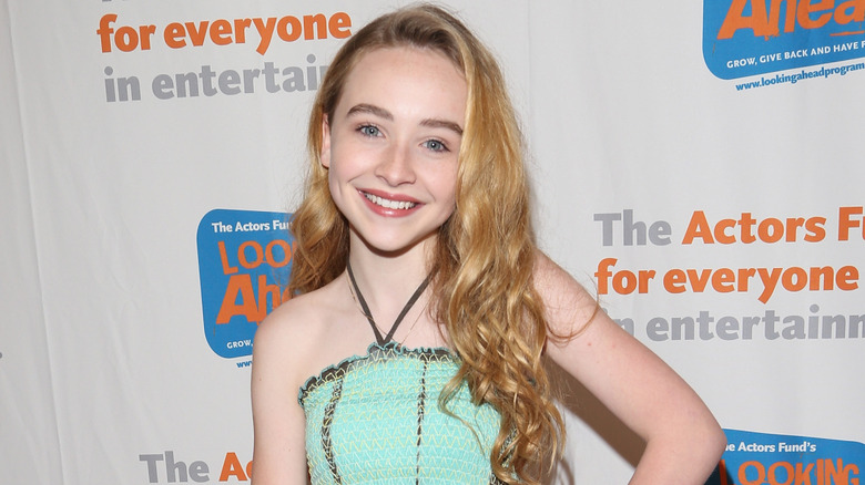Sabrina Carpenter posing at an event for The Actors Fund