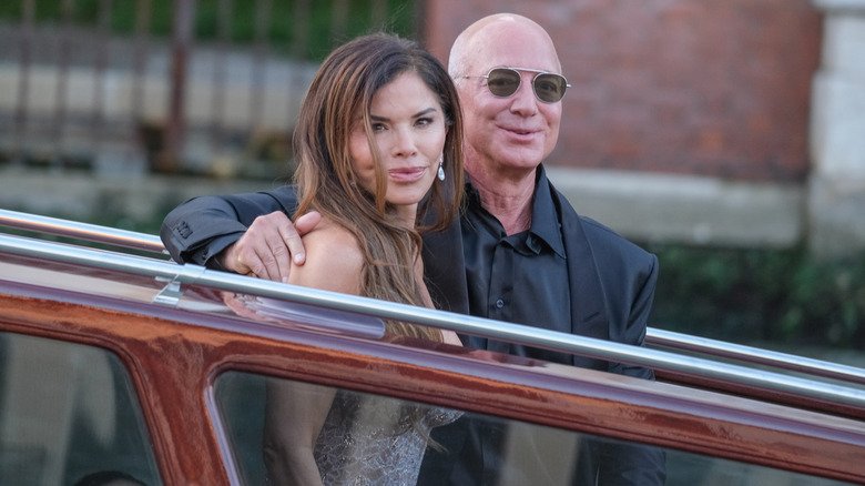 Jeff Bezos and Lauren Sanchez in a car