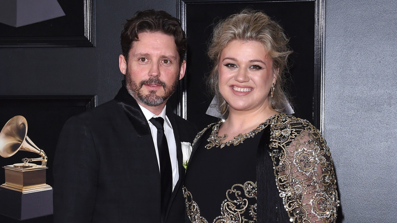 Brandon Blackstock and Kelly Clarkson posing