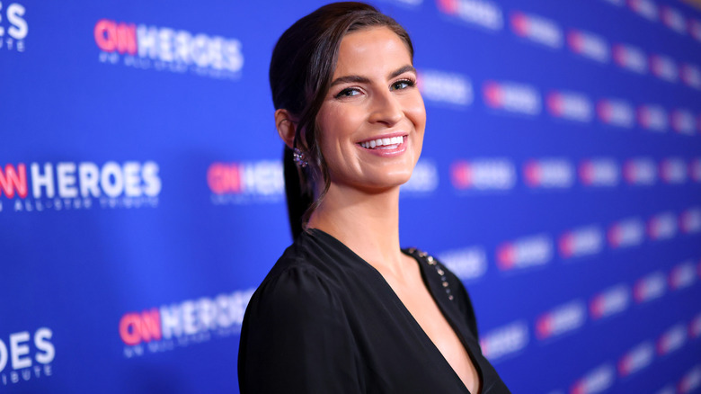 Kaitlan Collins smiling on the red carpet.