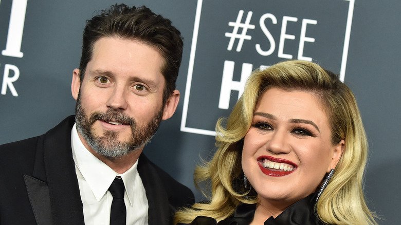 Brandon Blackstock and Kelly Clarkson smiling